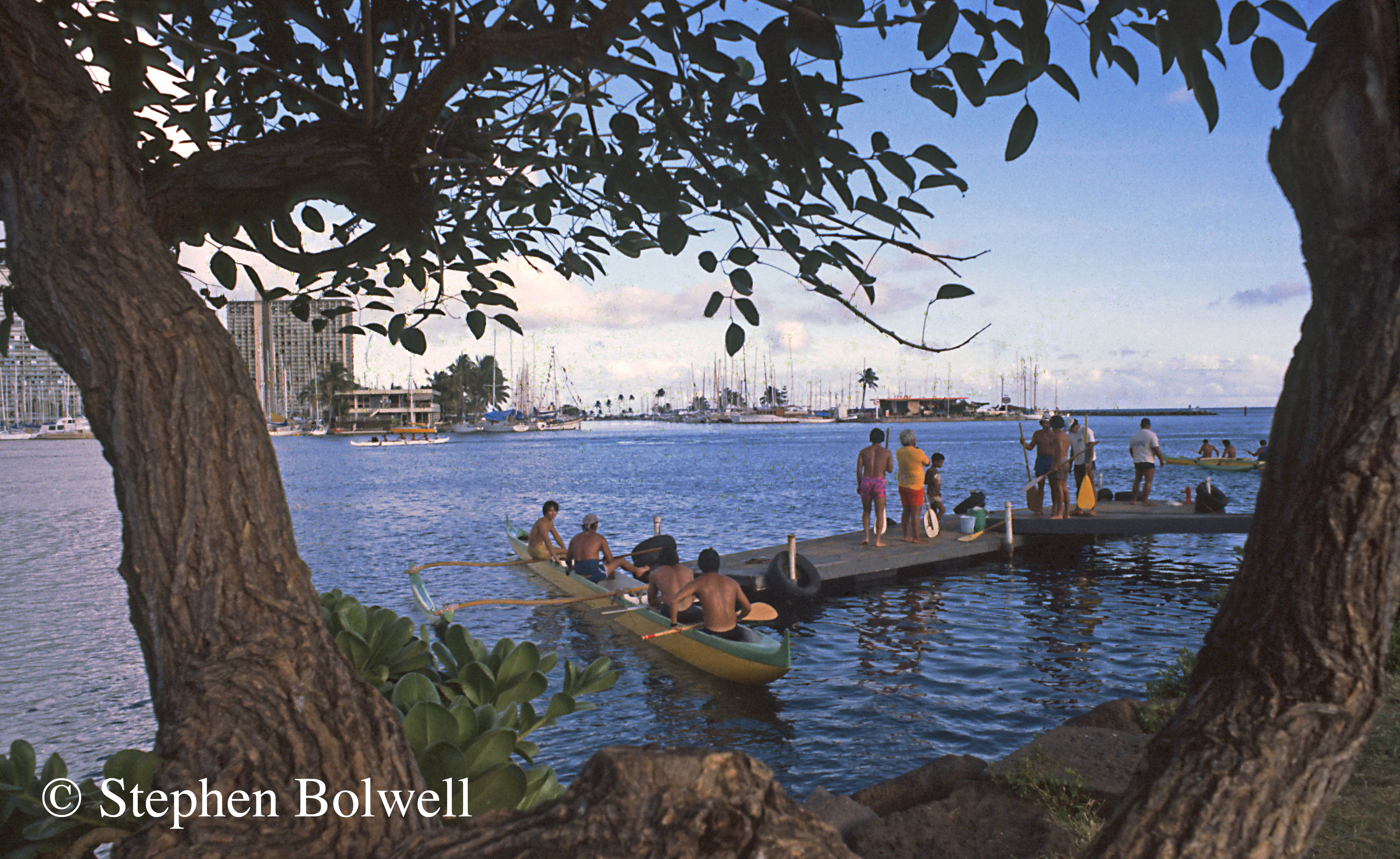 In Honolulu locals race canoes that have changed very little since Captain Cook's arrival on the Islands two hundred and one years before this picture was taken.