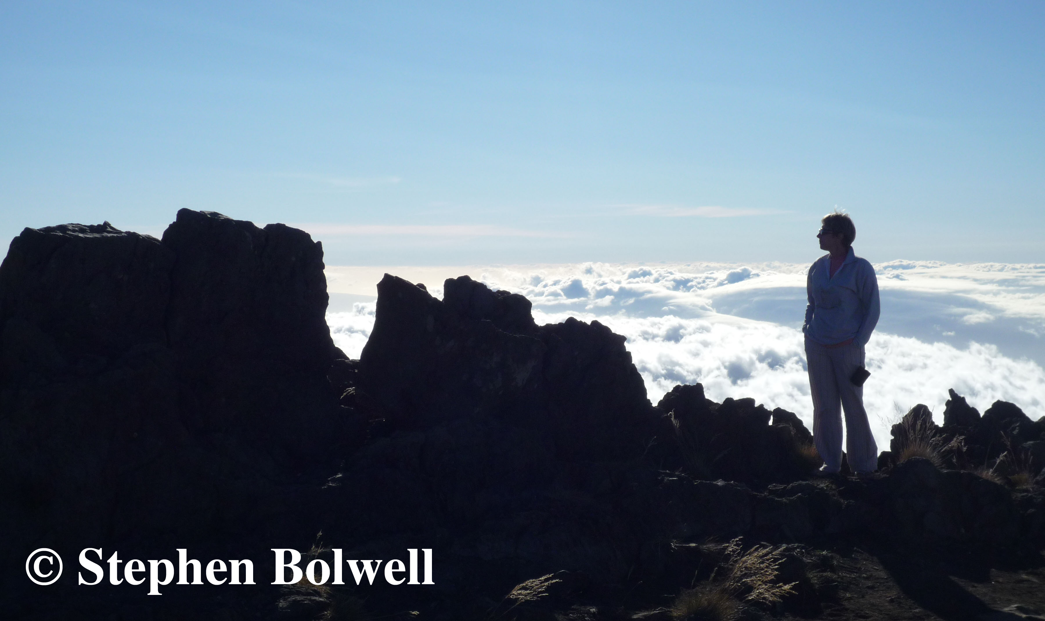 My wife Jen on Haleakala in 2010. Up above the clouds so high.