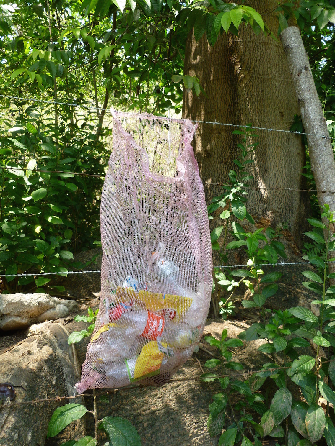 In another location walking out of the beautiful coastal town of Yelapa, litter dutifully goes into bags along the track, but litter reappears by the riverside once into the countryside where the collection bags run out.